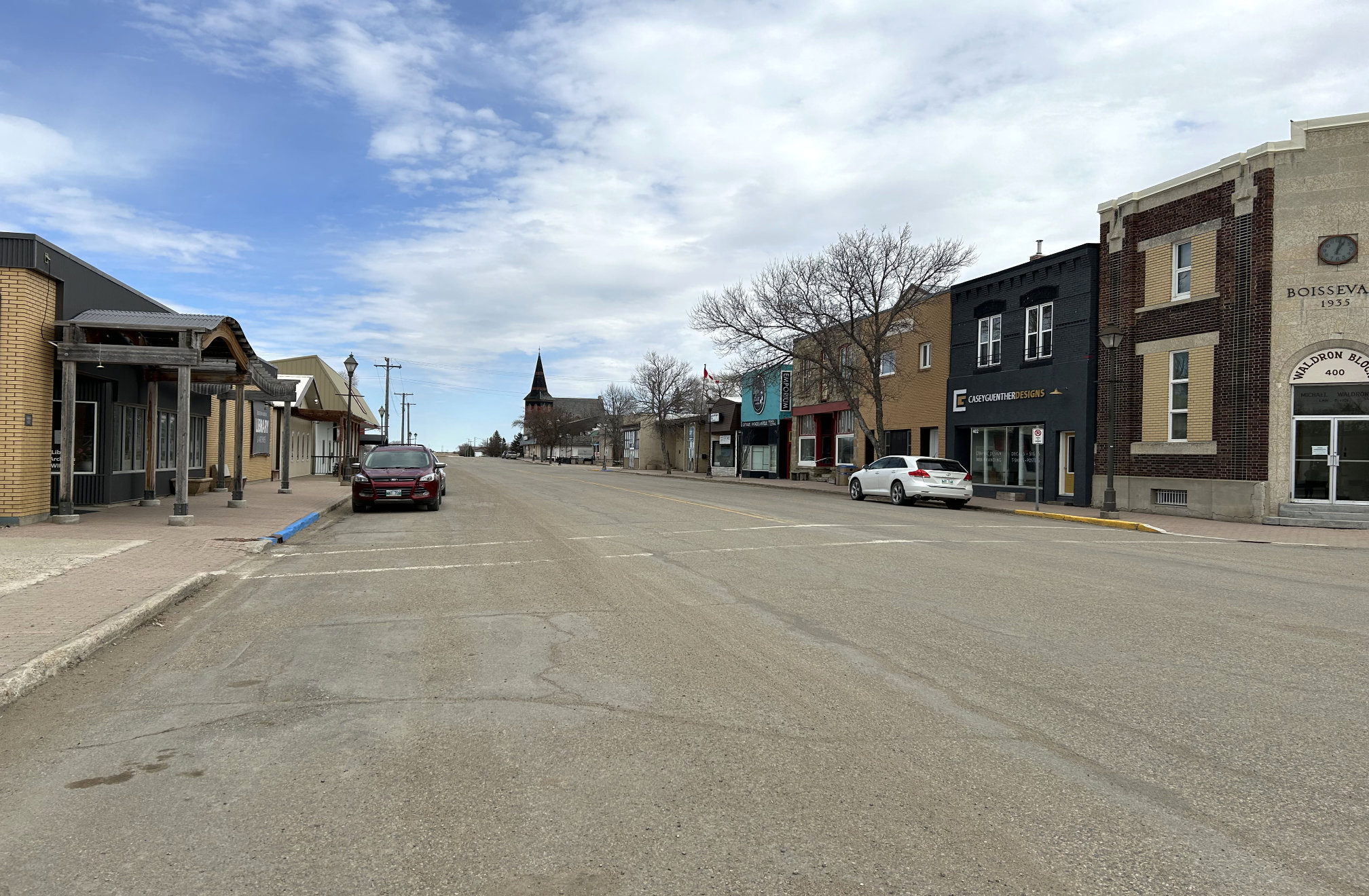 [2024 photo of South Railway looking west through the Cook Street intersection]
