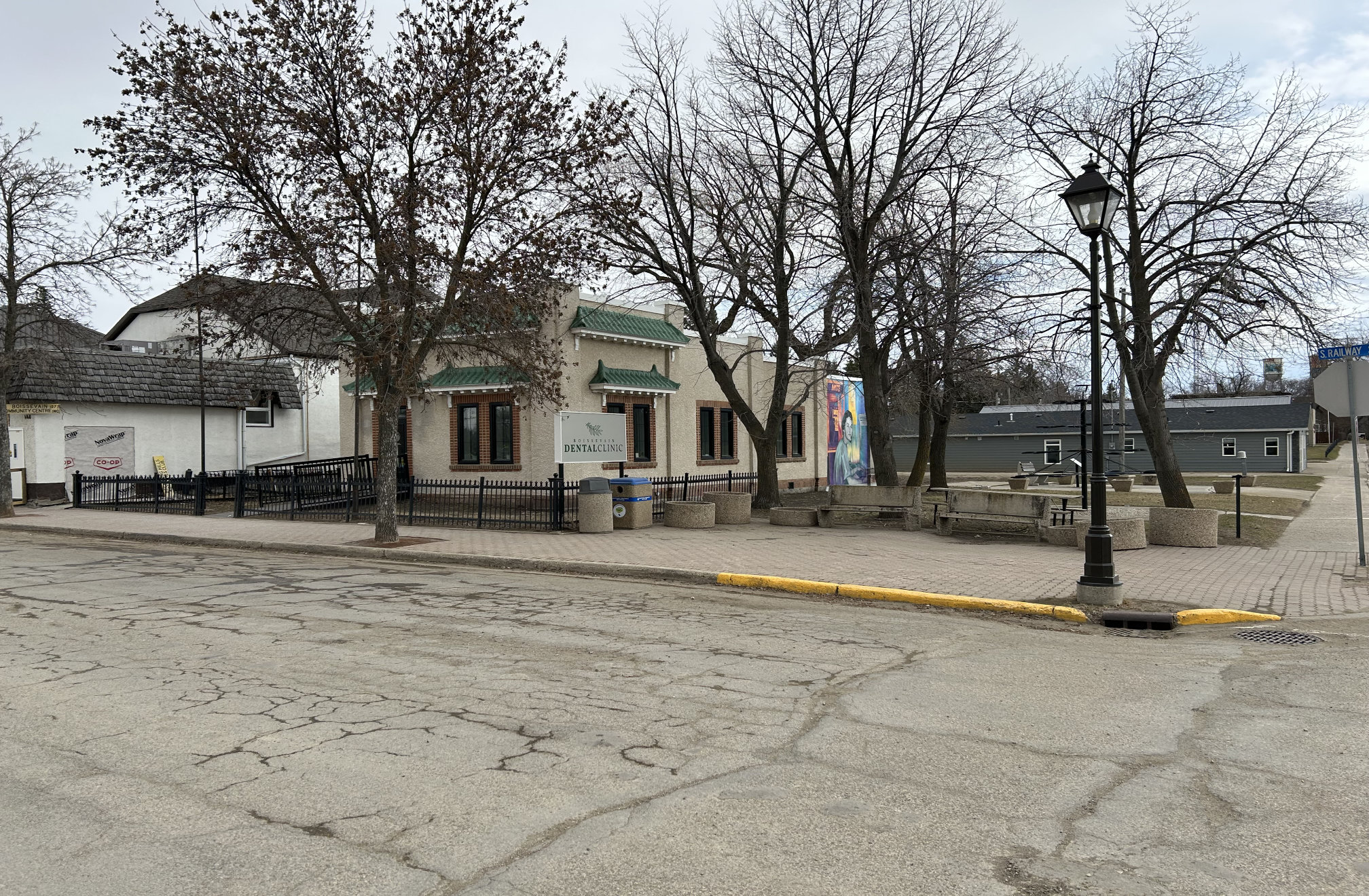 [2024 photo of the park at the corner of Broadway and South Railway]